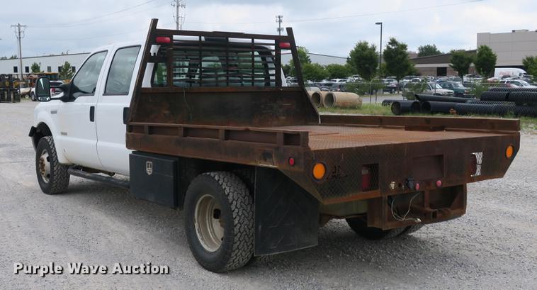 image for item DB8988 2006 Ford F350 Super Duty Crew Cab flatbed pickup truck