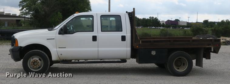 image for item DB8988 2006 Ford F350 Super Duty Crew Cab flatbed pickup truck
