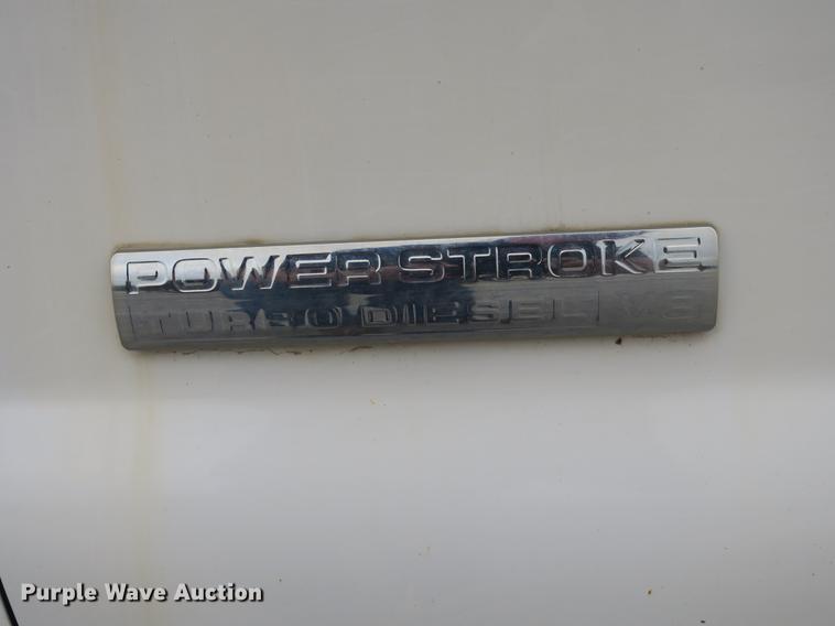 image for item DB8988 2006 Ford F350 Super Duty Crew Cab flatbed pickup truck