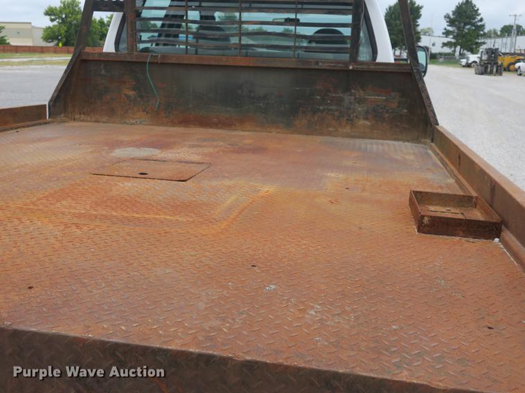 image for item DB8988 2006 Ford F350 Super Duty Crew Cab flatbed pickup truck