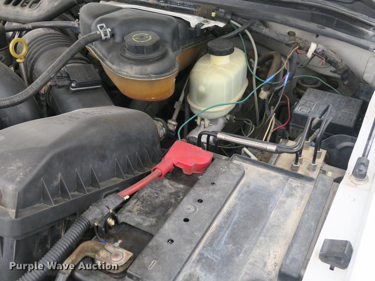 image for item DB8988 2006 Ford F350 Super Duty Crew Cab flatbed pickup truck