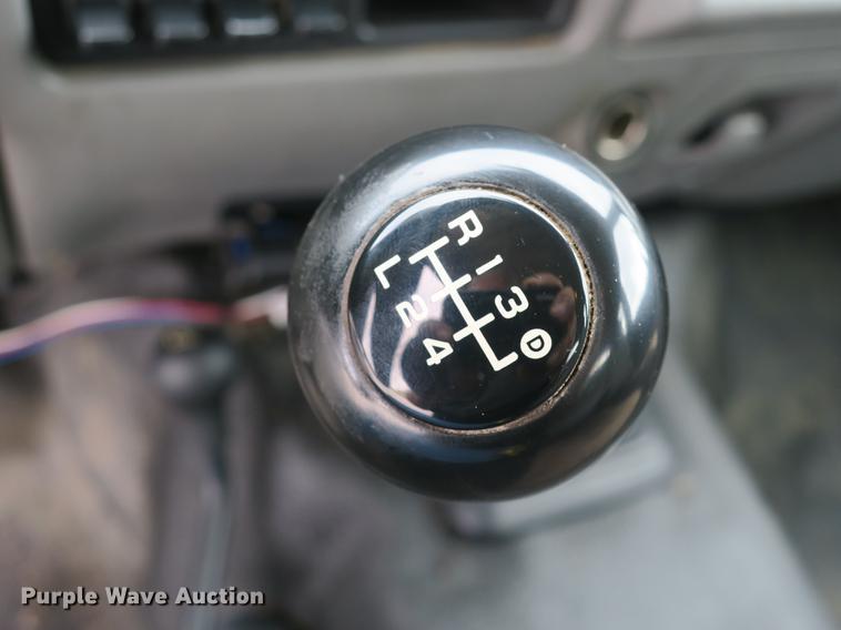 image for item DB8988 2006 Ford F350 Super Duty Crew Cab flatbed pickup truck