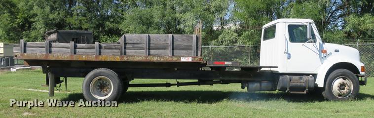 image for item DB8975 2000 International 4700 flat dump bed truck