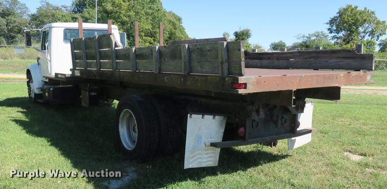 image for item DB8975 2000 International 4700 flat dump bed truck