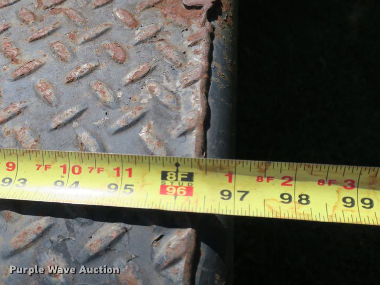 image for item DB8975 2000 International 4700 flat dump bed truck