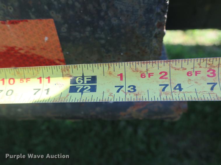 image for item DB8975 2000 International 4700 flat dump bed truck