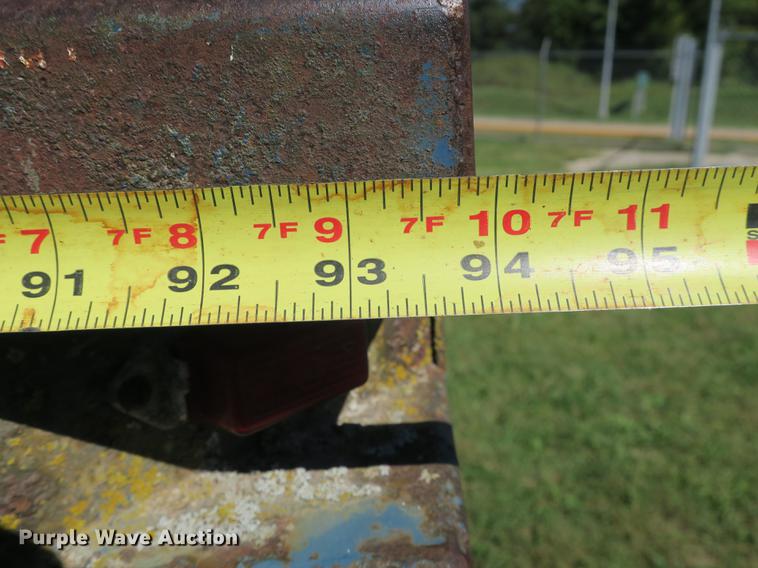 image for item DB8975 2000 International 4700 flat dump bed truck