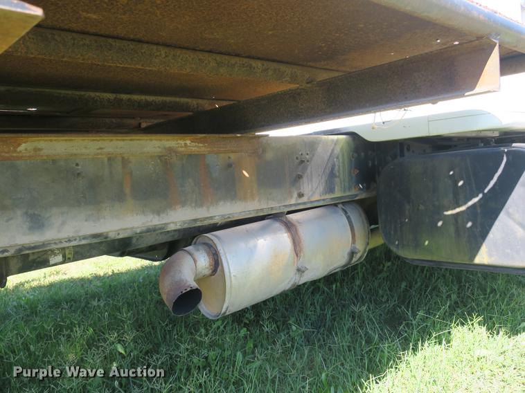 image for item DB8975 2000 International 4700 flat dump bed truck