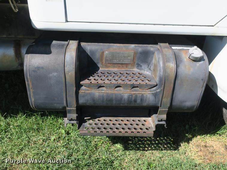 image for item DB8975 2000 International 4700 flat dump bed truck