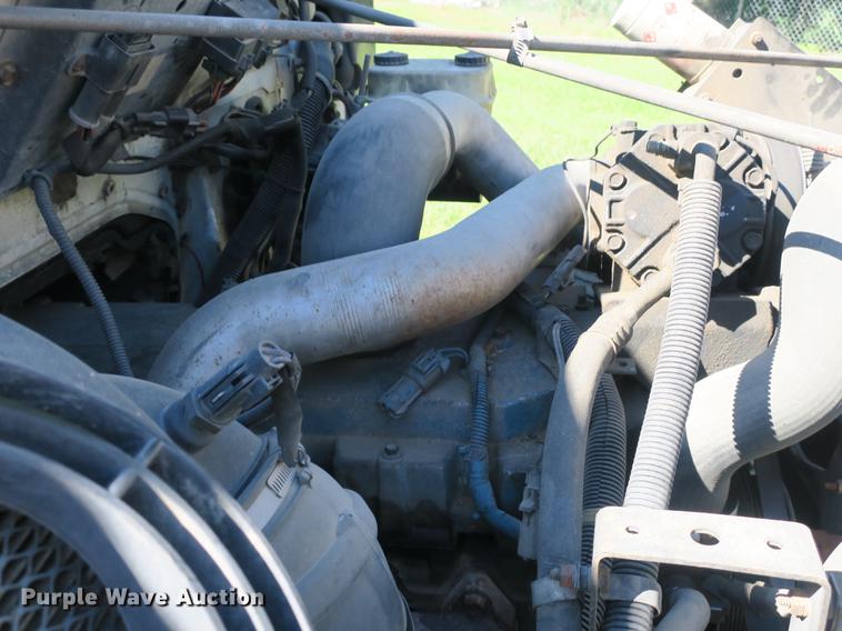 image for item DB8975 2000 International 4700 flat dump bed truck