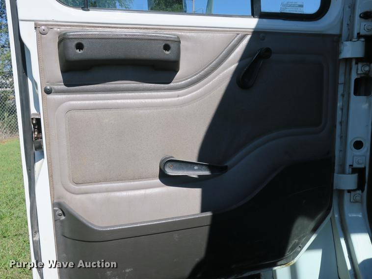 image for item DB8975 2000 International 4700 flat dump bed truck