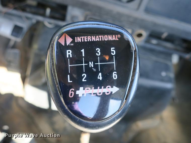 image for item DB8975 2000 International 4700 flat dump bed truck