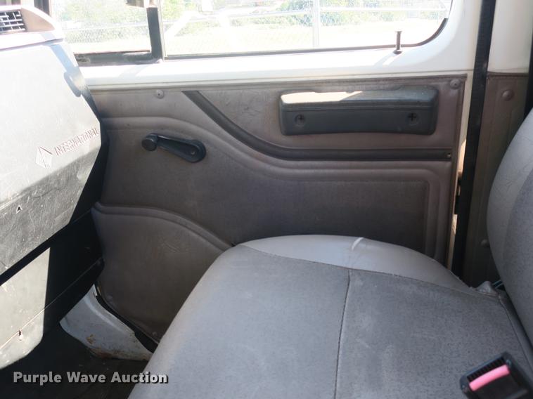 image for item DB8975 2000 International 4700 flat dump bed truck