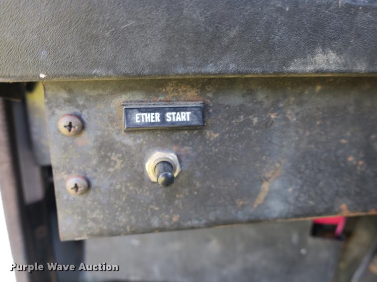 image for item DB8975 2000 International 4700 flat dump bed truck