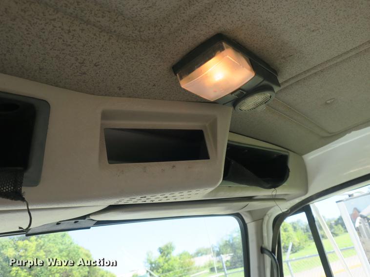 image for item DB8975 2000 International 4700 flat dump bed truck