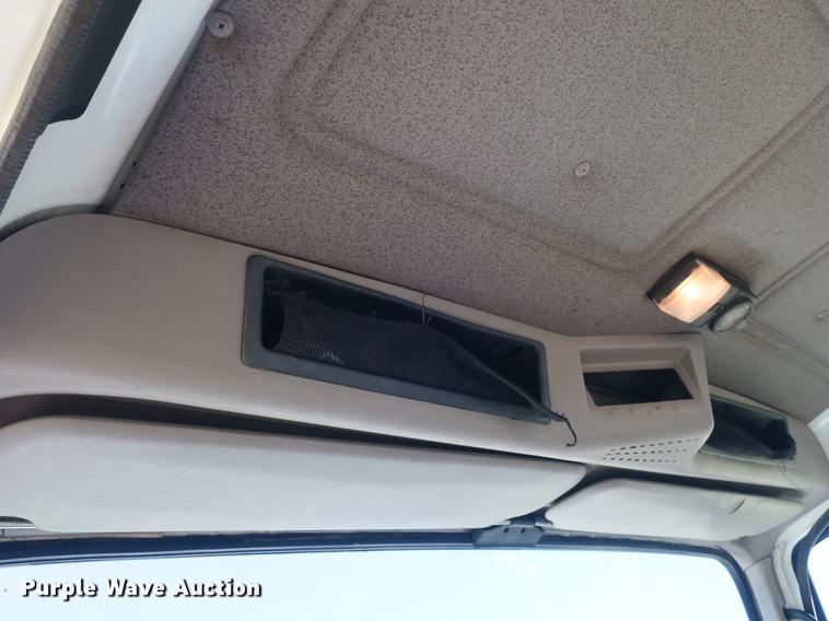 image for item DB8975 2000 International 4700 flat dump bed truck