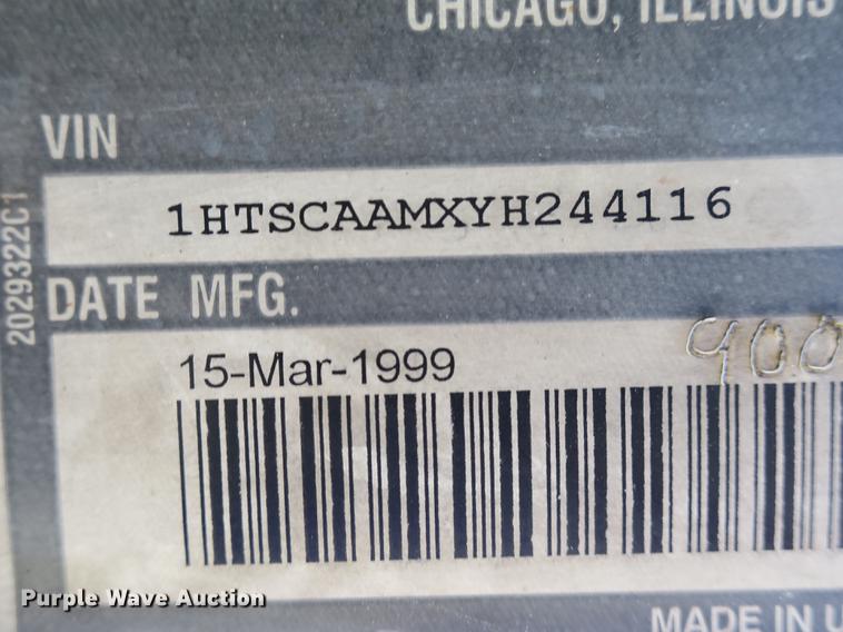 image for item DB8975 2000 International 4700 flat dump bed truck