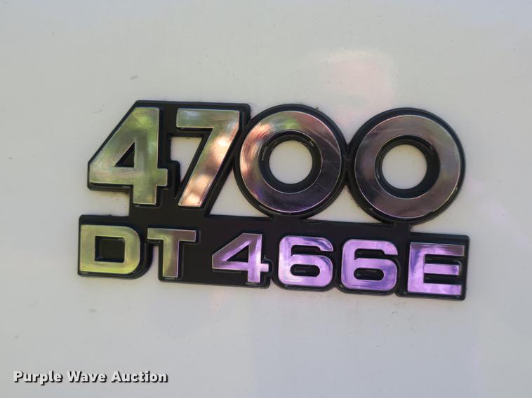 image for item DB8975 2000 International 4700 flat dump bed truck