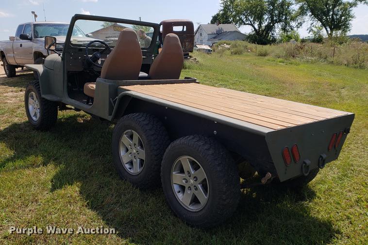 image for item EF9861 1976 Jeep flat bed truck