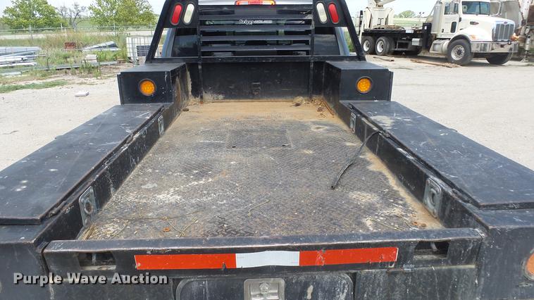 image for item ES9390 2013 Dodge Ram 2500 Crew Cab flatbed pickup truck