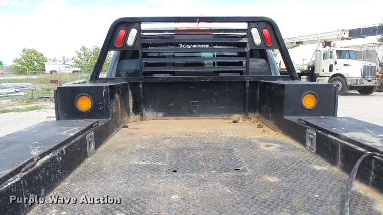 image for item ES9390 2013 Dodge Ram 2500 Crew Cab flatbed pickup truck