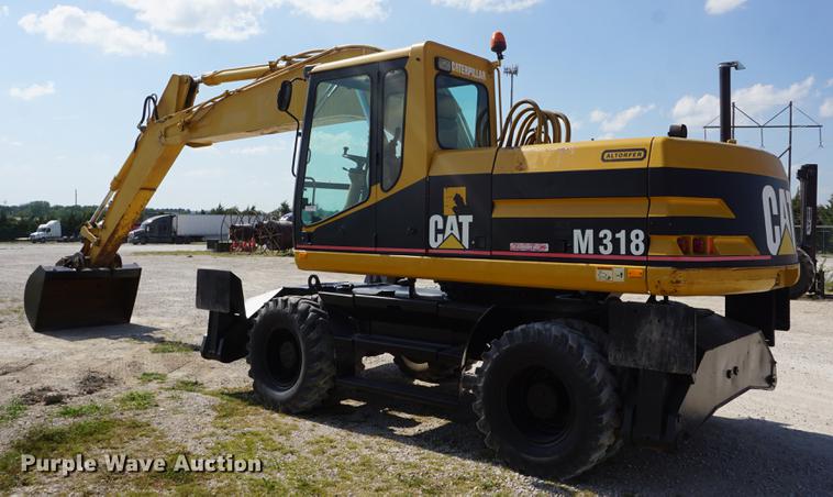 image for item DD6552 1995 Caterpillar M318 rubber tire excavator