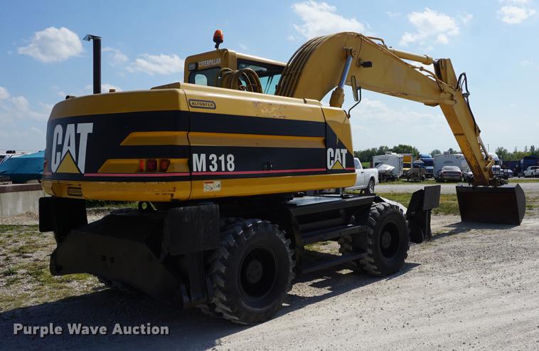image for item DD6552 1995 Caterpillar M318 rubber tire excavator