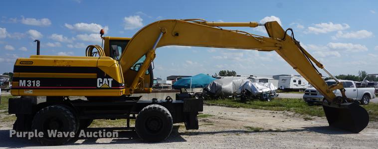 image for item DD6552 1995 Caterpillar M318 rubber tire excavator