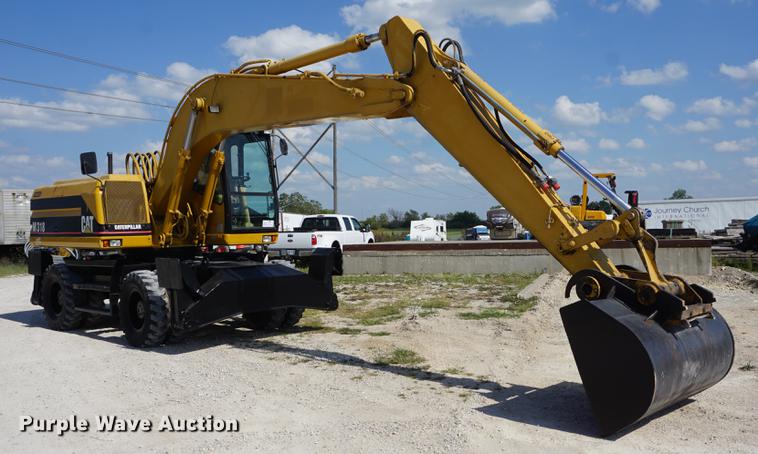 image for item DD6552 1995 Caterpillar M318 rubber tire excavator