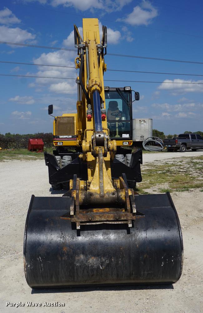 image for item DD6552 1995 Caterpillar M318 rubber tire excavator