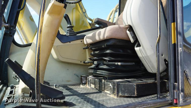 image for item DD6552 1995 Caterpillar M318 rubber tire excavator