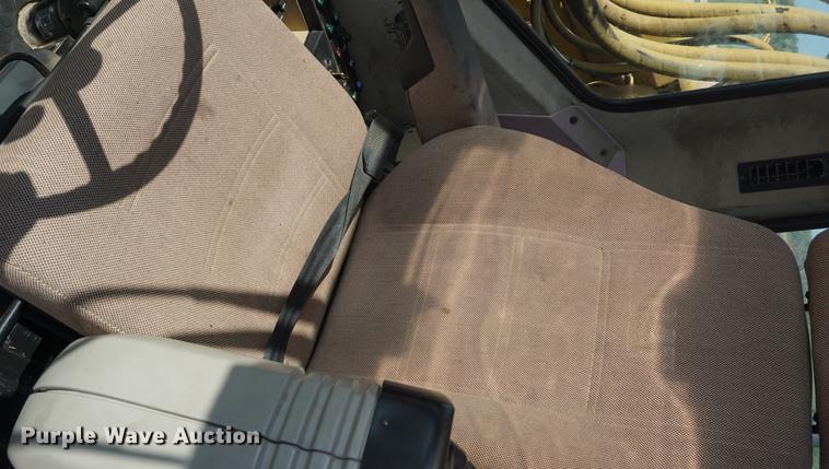 image for item DD6552 1995 Caterpillar M318 rubber tire excavator