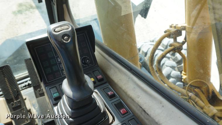 image for item DD6552 1995 Caterpillar M318 rubber tire excavator