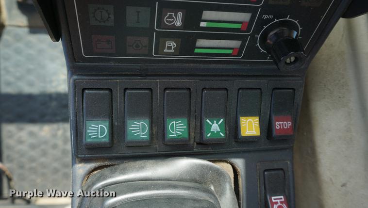 image for item DD6552 1995 Caterpillar M318 rubber tire excavator