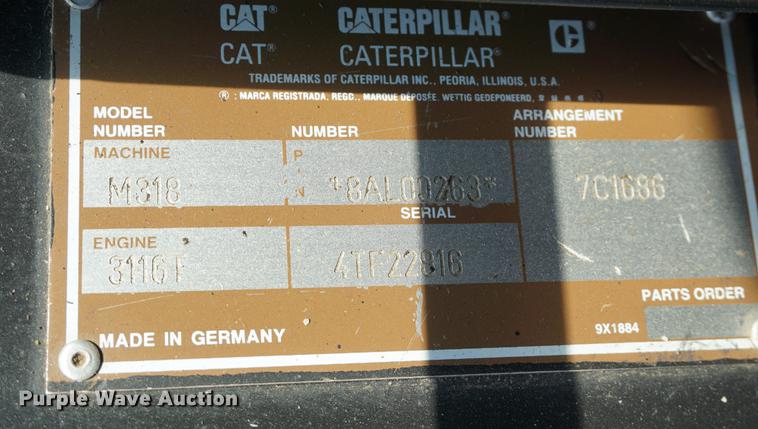 image for item DD6552 1995 Caterpillar M318 rubber tire excavator