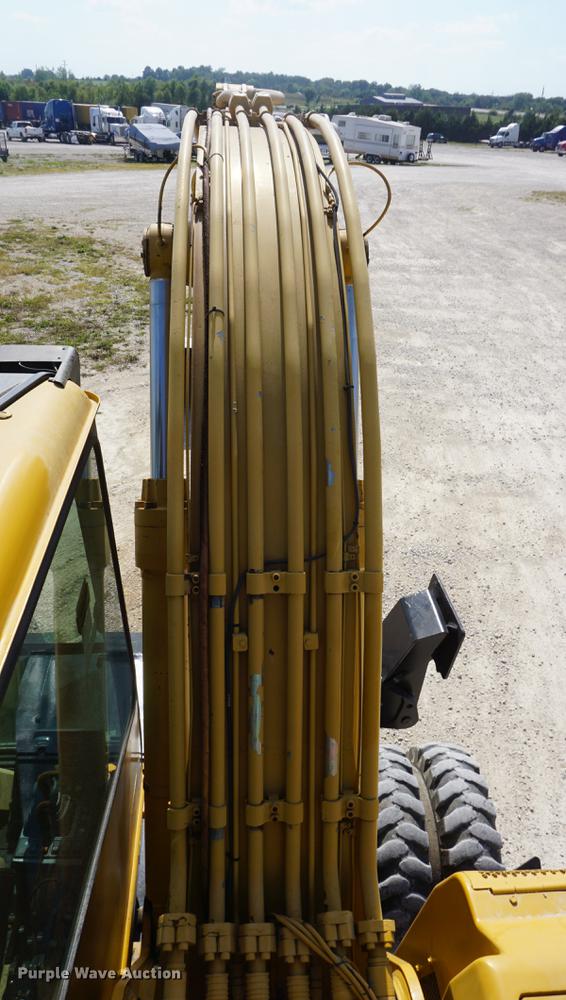 image for item DD6552 1995 Caterpillar M318 rubber tire excavator