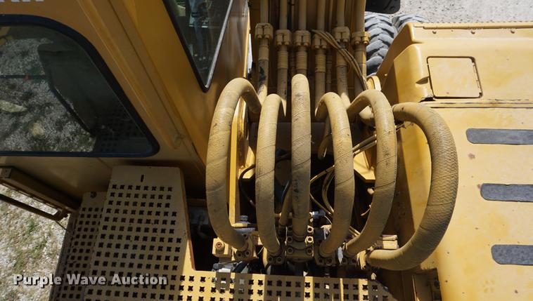 image for item DD6552 1995 Caterpillar M318 rubber tire excavator