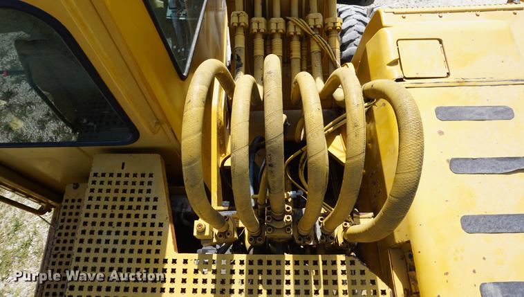 image for item DD6552 1995 Caterpillar M318 rubber tire excavator