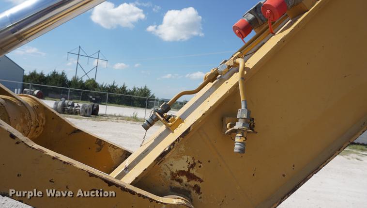 image for item DD6552 1995 Caterpillar M318 rubber tire excavator