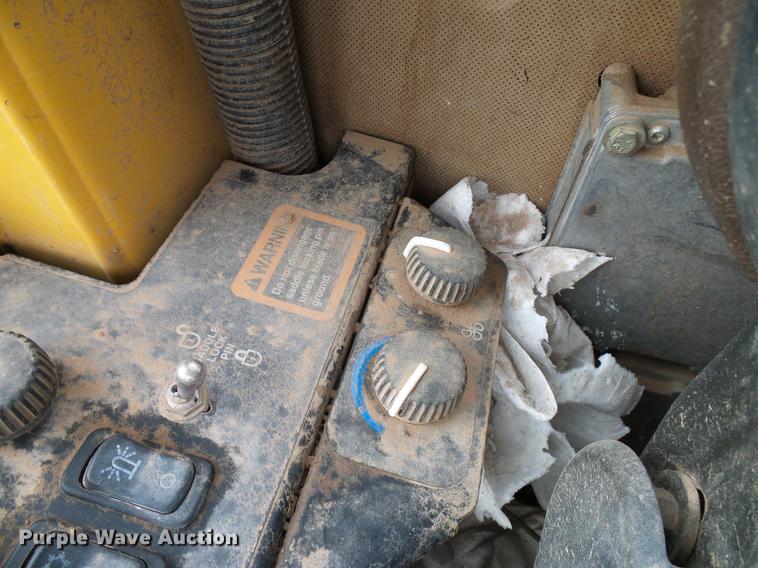 image for item DD8249 2000 John Deere 772CH motor grader