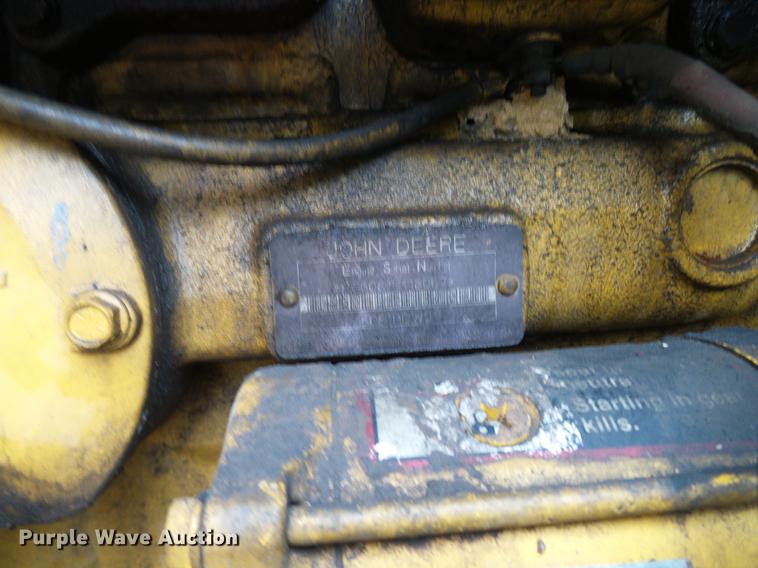 image for item DD8249 2000 John Deere 772CH motor grader