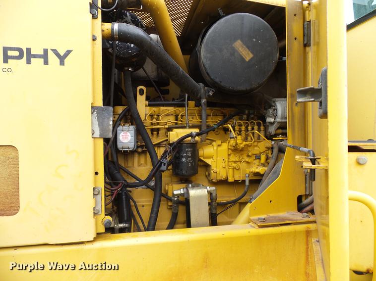 image for item DD8249 2000 John Deere 772CH motor grader