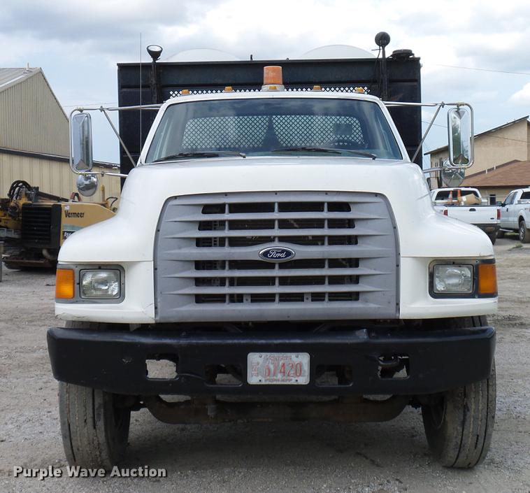 image for item DD8312 1998 Ford F800 flatbed truck with Vermeer MTE37 mud mix system