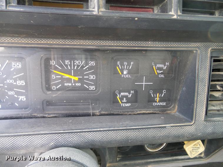 image for item DD8312 1998 Ford F800 flatbed truck with Vermeer MTE37 mud mix system