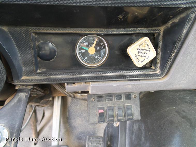 image for item DD8312 1998 Ford F800 flatbed truck with Vermeer MTE37 mud mix system