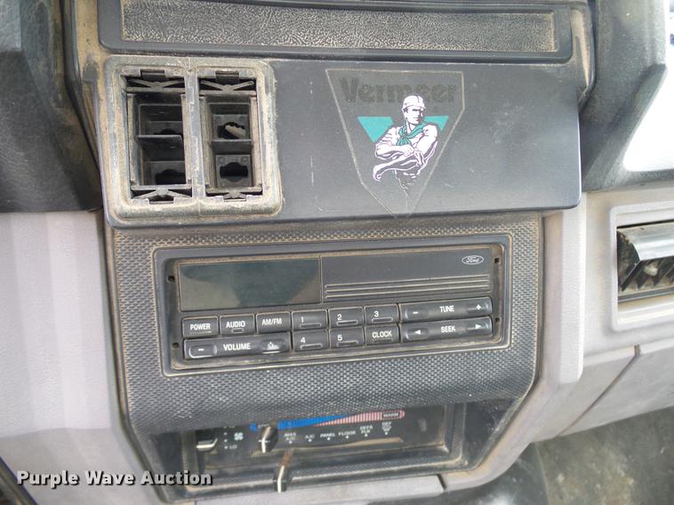 image for item DD8312 1998 Ford F800 flatbed truck with Vermeer MTE37 mud mix system