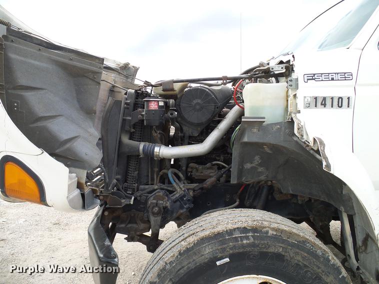 image for item DD8312 1998 Ford F800 flatbed truck with Vermeer MTE37 mud mix system