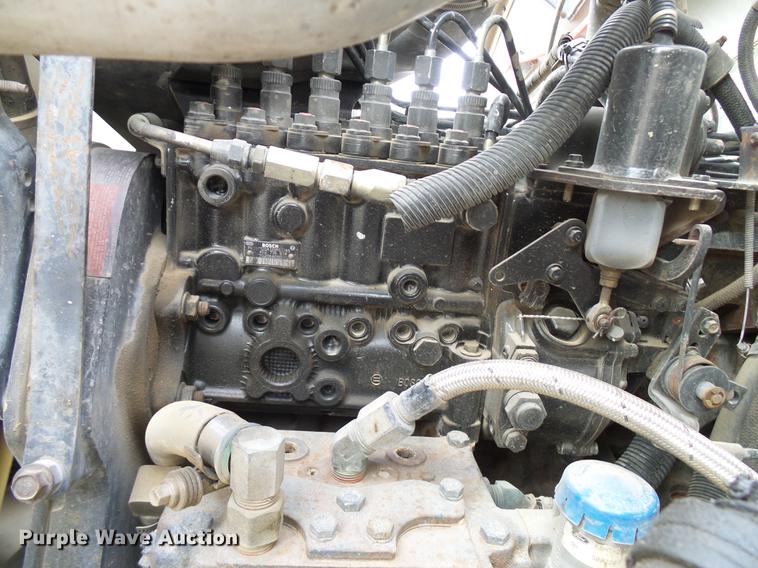 image for item DD8312 1998 Ford F800 flatbed truck with Vermeer MTE37 mud mix system