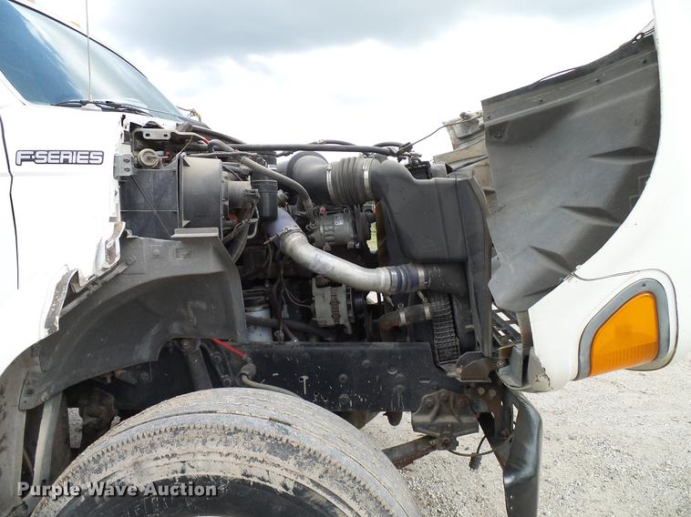 image for item DD8312 1998 Ford F800 flatbed truck with Vermeer MTE37 mud mix system