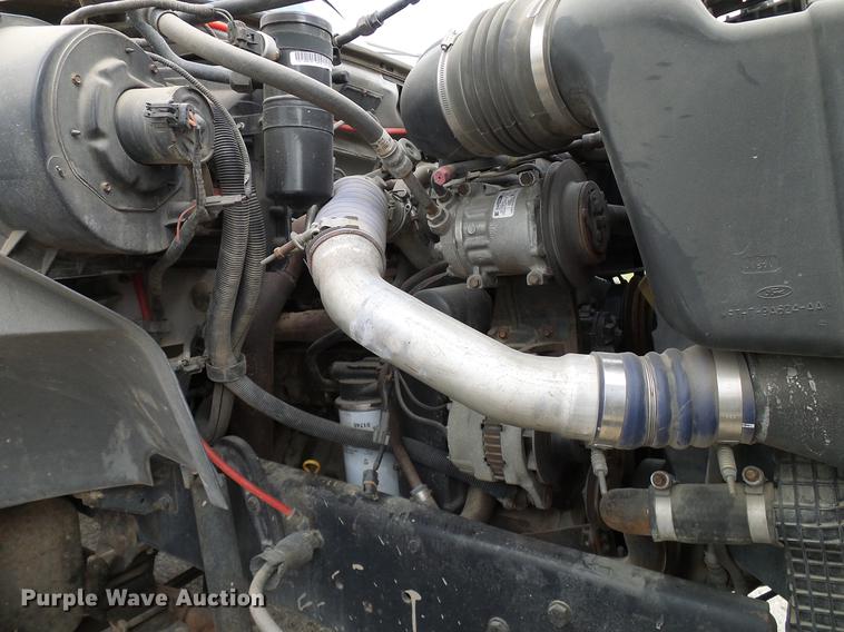 image for item DD8312 1998 Ford F800 flatbed truck with Vermeer MTE37 mud mix system